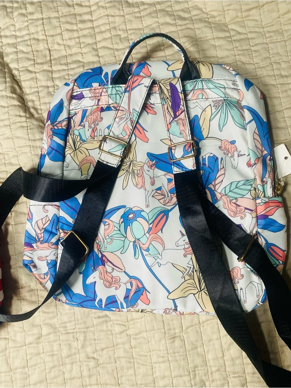 three backpacks of different sizes